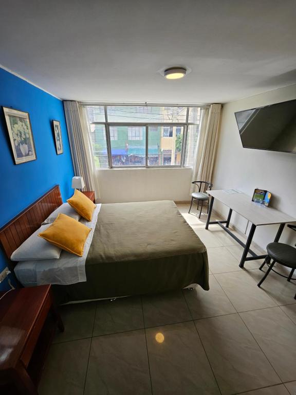 Postel nebo postele na pokoji v ubytování Hotel Acuario