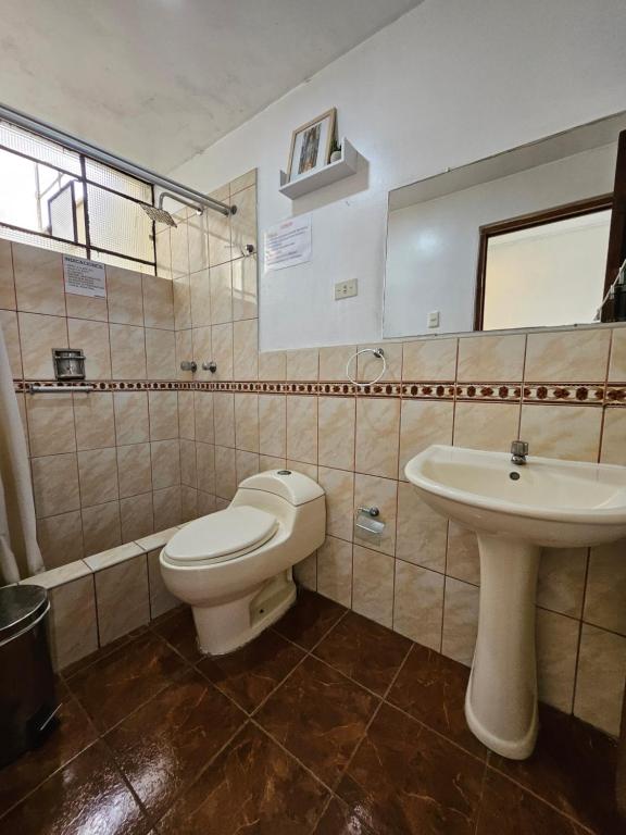 Koupelna v ubytování Hotel Acuario
