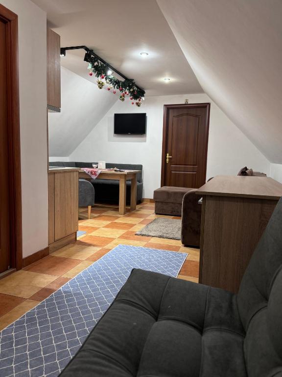 TV a/nebo společenská místnost v ubytování Monica