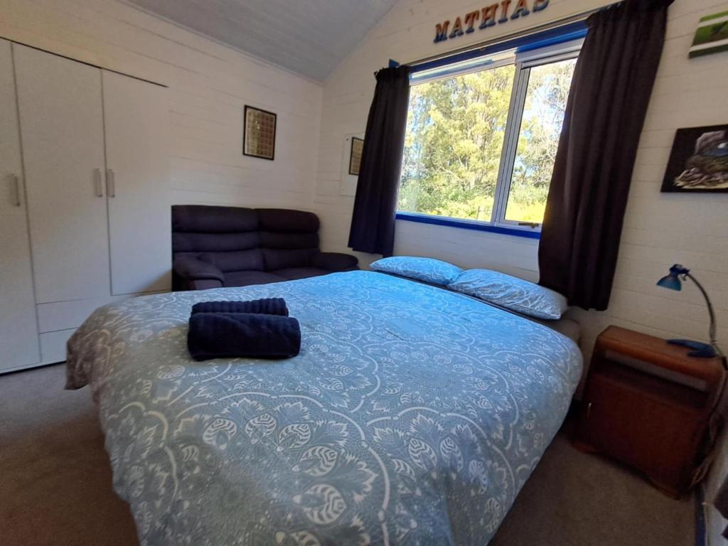 Cottage and geothermal pool by lake Taupo - Resim 2