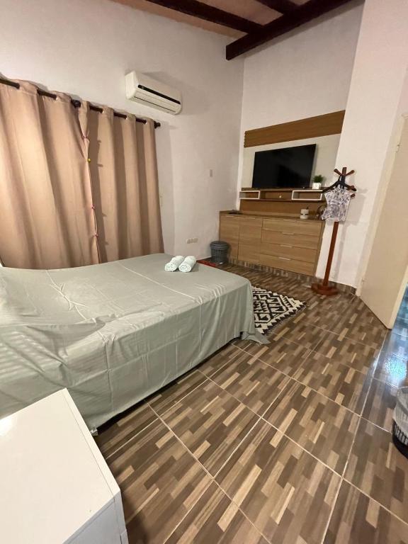 Postel nebo postele na pokoji v ubytování Rincón Soñado