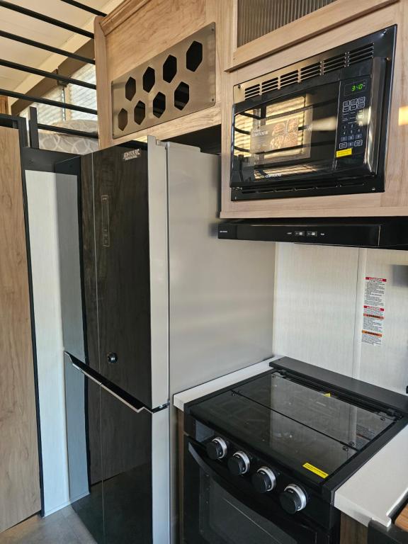 Kuchyň nebo kuchyňský kout v ubytování Sun Tinyhouse C
