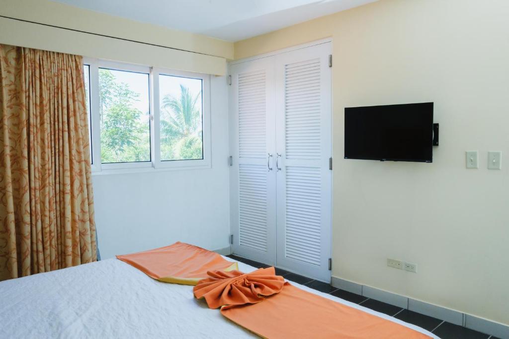 TV a/nebo společenská místnost v ubytování Las Olas Beach Resort