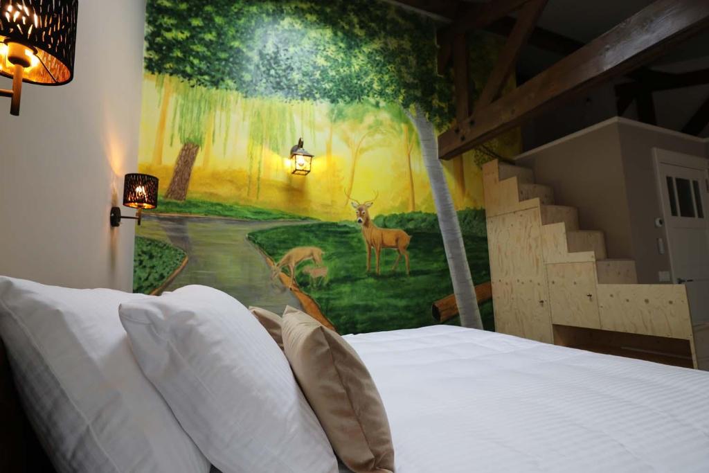 Postel nebo postele na pokoji v ubytování B&B Eemswolde
