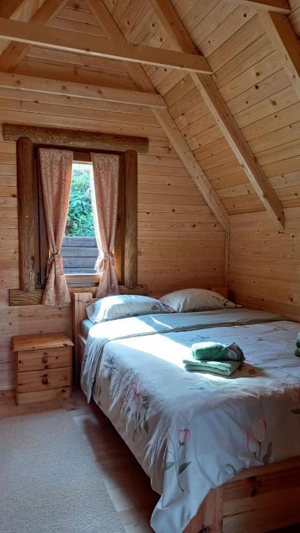 Postel nebo postele na pokoji v ubytování Kamp Kruščić - Laništa