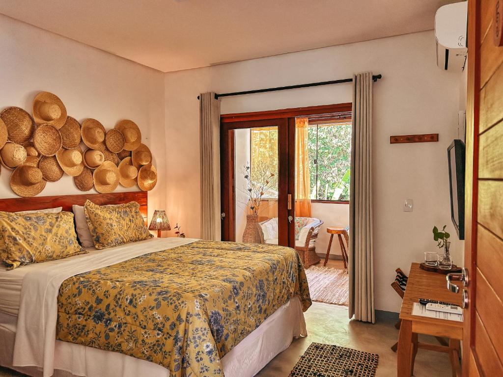 Postel nebo postele na pokoji v ubytování Maruê Guesthouse Porto de Pedras