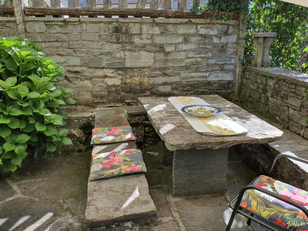 Patio nebo venkovní prostory v ubytování Rustico La Rocca by Fewotessin
