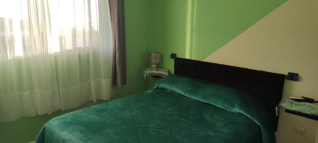 Postel nebo postele na pokoji v ubytování Departamento bahía de quintero