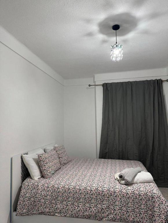 Postel nebo postele na pokoji v ubytování Apartment in martil
