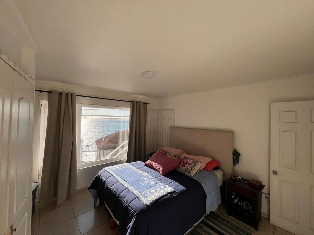 Ένα ή περισσότερα κρεβάτια σε δωμάτιο στο Reñaca