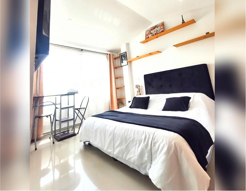 Postel nebo postele na pokoji v ubytování HABITACIÓN AMPLIA y CÓMODA CON BAÑO PRIVADO
