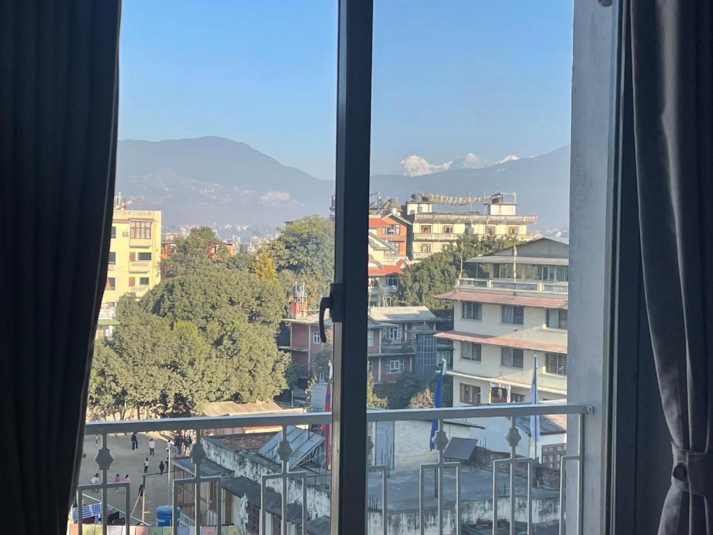 Nespecifikovaný výhled na hory nebo výhled na hory při pohledu z hotelu