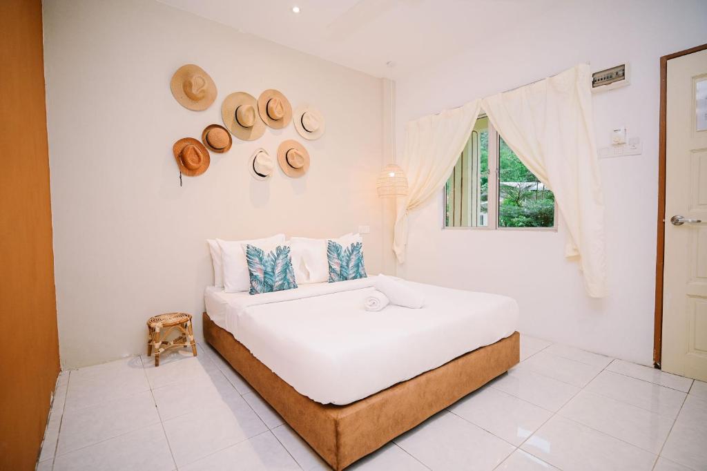 Postel nebo postele na pokoji v ubytování LiLLA Rainforest Retreat - Hulu Langat