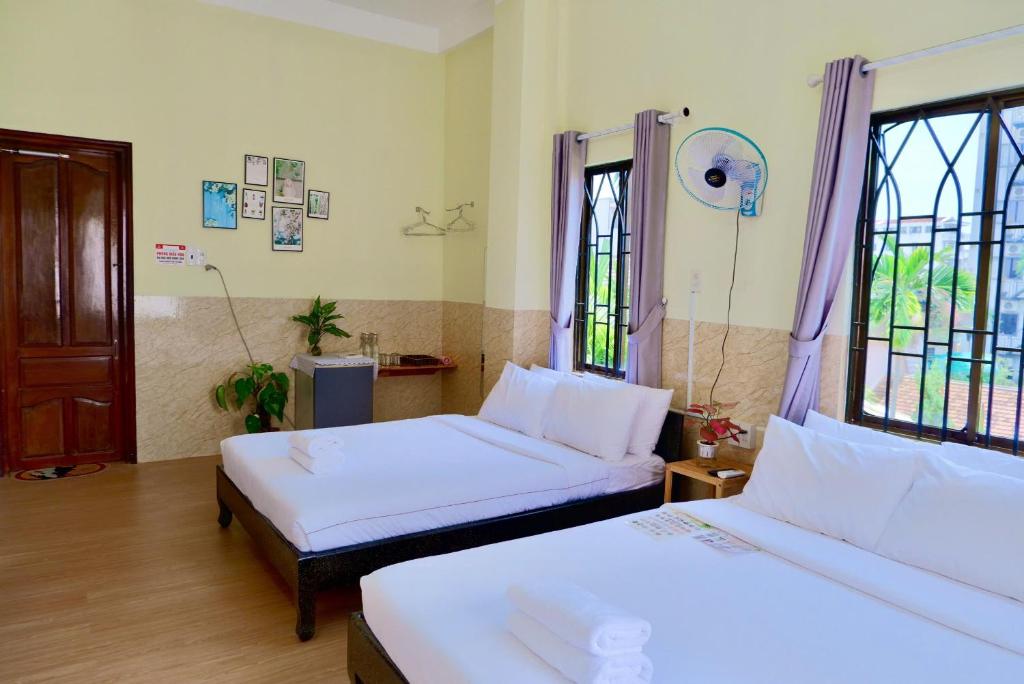 Giường trong phòng chung tại Hue Ancient Town - Homestay in Hue