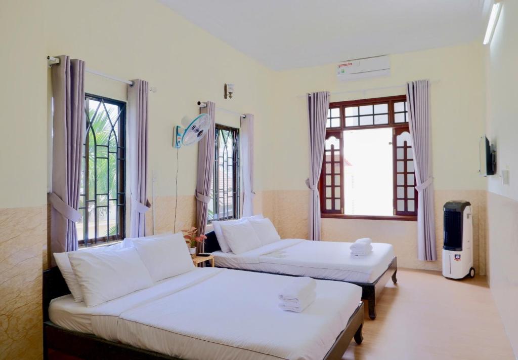 Giường trong phòng chung tại Hue Ancient Town - Homestay in Hue