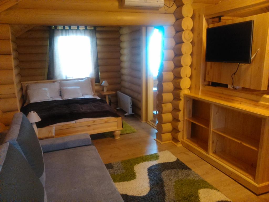 TV a/nebo společenská místnost v ubytování Tuzséri Pálinka Tanya