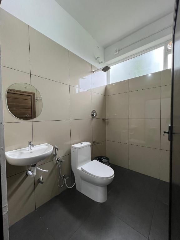 Koupelna v ubytování Hotel Aamis Villa