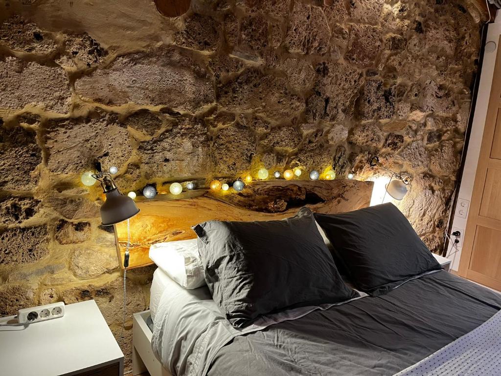 Postel nebo postele na pokoji v ubytování La Milana, Orbaneja del Castillo