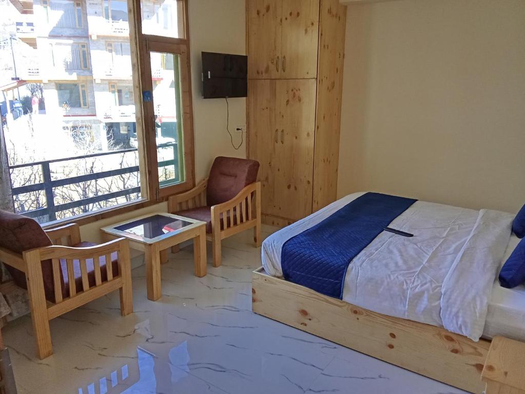 Postel nebo postele na pokoji v ubytování SkyWay HomeStay