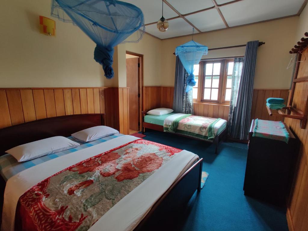 Postel nebo postele na pokoji v ubytování Carnation Rest
