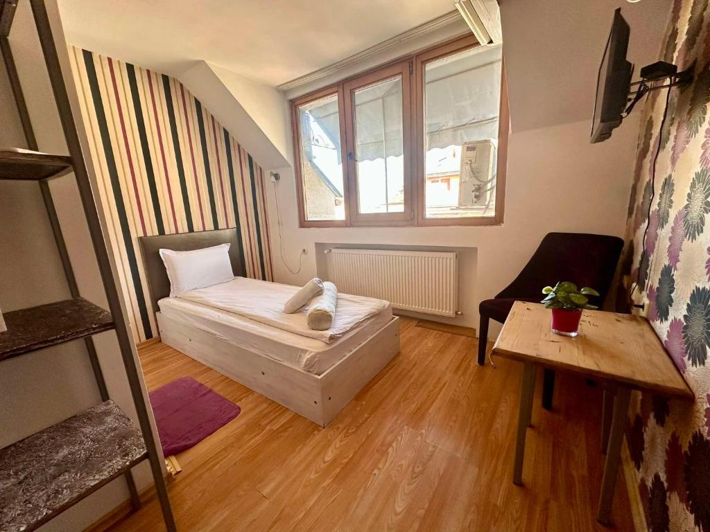 Postel nebo postele na pokoji v ubytování Family Hotel Amor