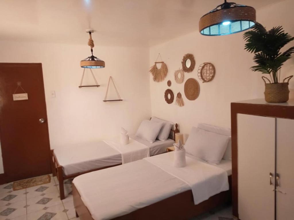 Postel nebo postele na pokoji v ubytování Maliag Studio Type Room for Rent