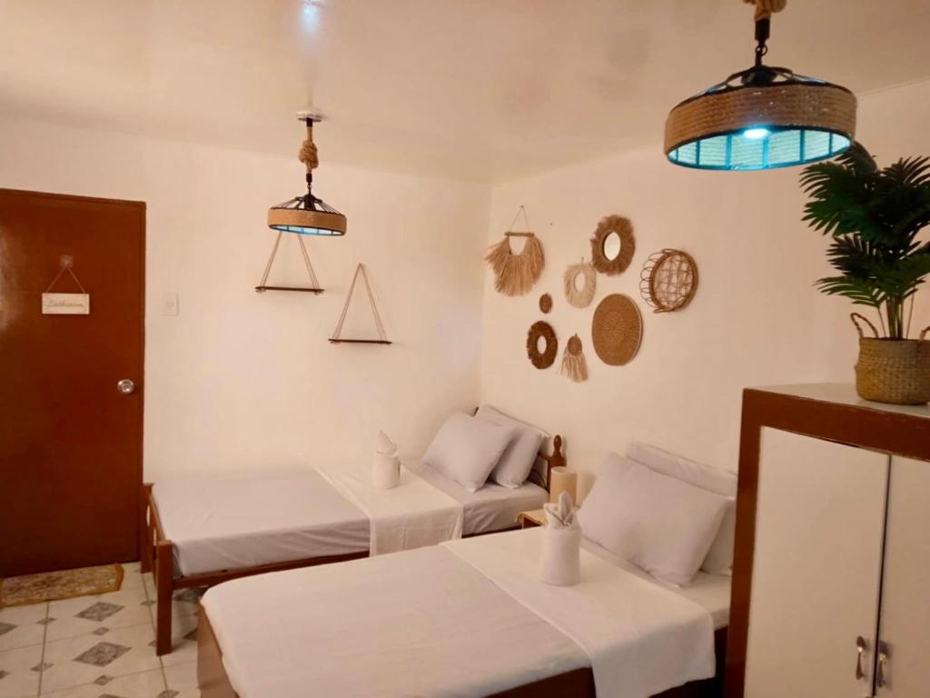 Postel nebo postele na pokoji v ubytování Maliag Studio Type Room for Rent