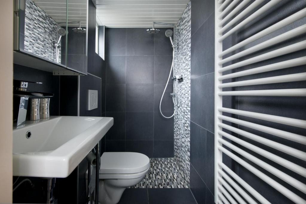 Koupelna v ubytování Hotel Domburg4you