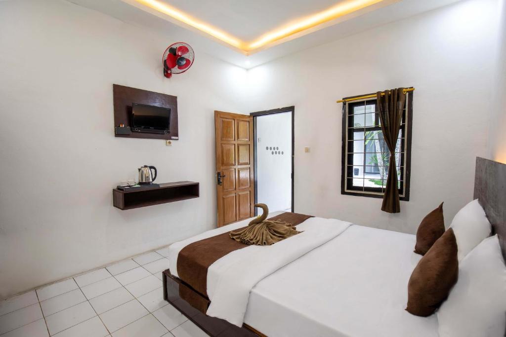 Pondok Tetebatu Cottages and Cafe - Quarto Duplo Com Vista Para O Jardim