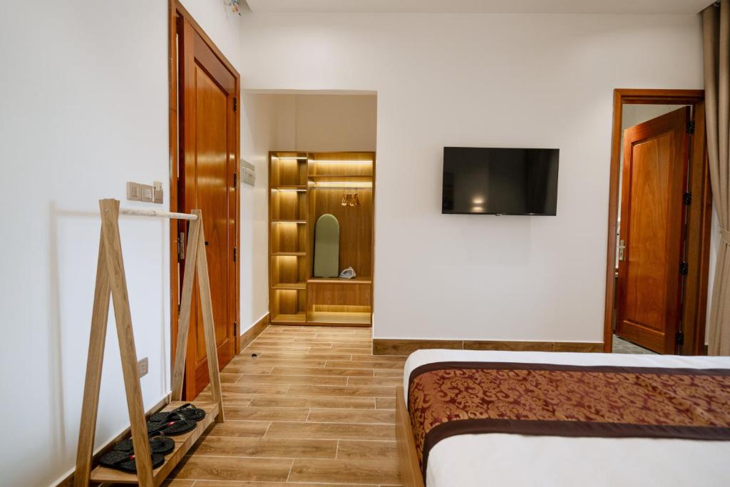 TV a/nebo společenská místnost v ubytování L'Universo Premium Apartment