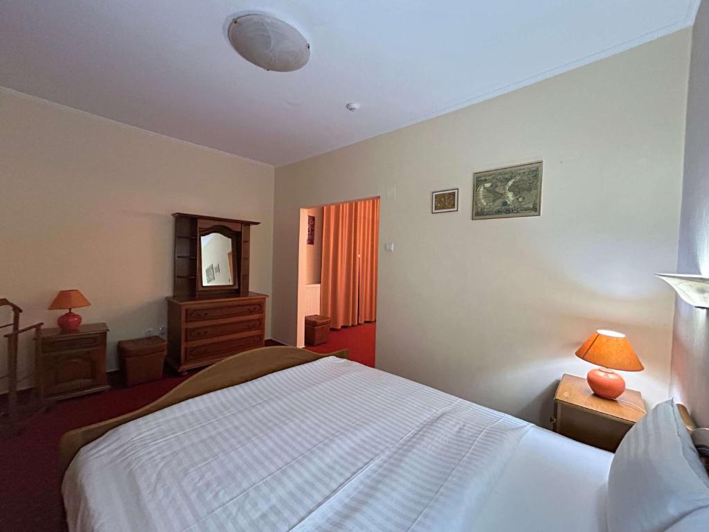 Postel nebo postele na pokoji v ubytování ibis Styles Dunarea Galati