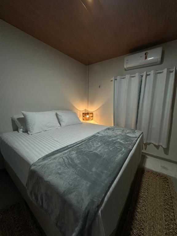 Postel nebo postele na pokoji v ubytování Maison Plage Atins
