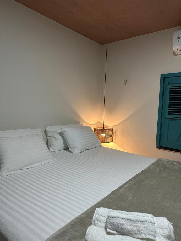 Postel nebo postele na pokoji v ubytování Maison Plage Atins
