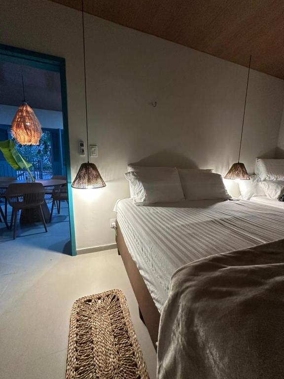 Postel nebo postele na pokoji v ubytování Maison Plage Atins