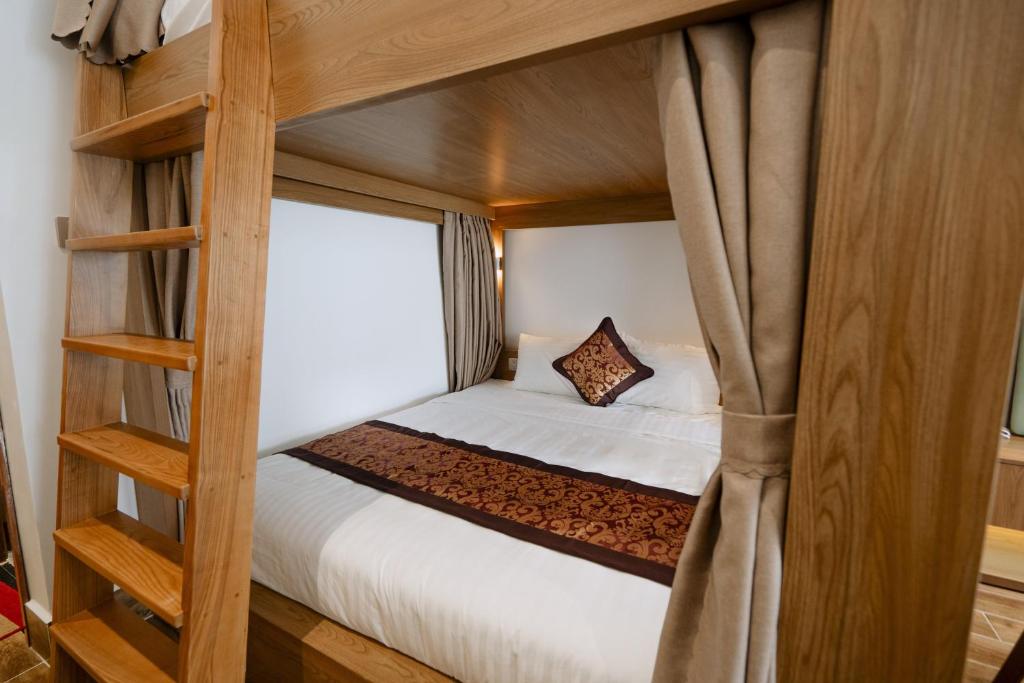 Postel nebo postele na pokoji v ubytování L'Universo Premium Apartment