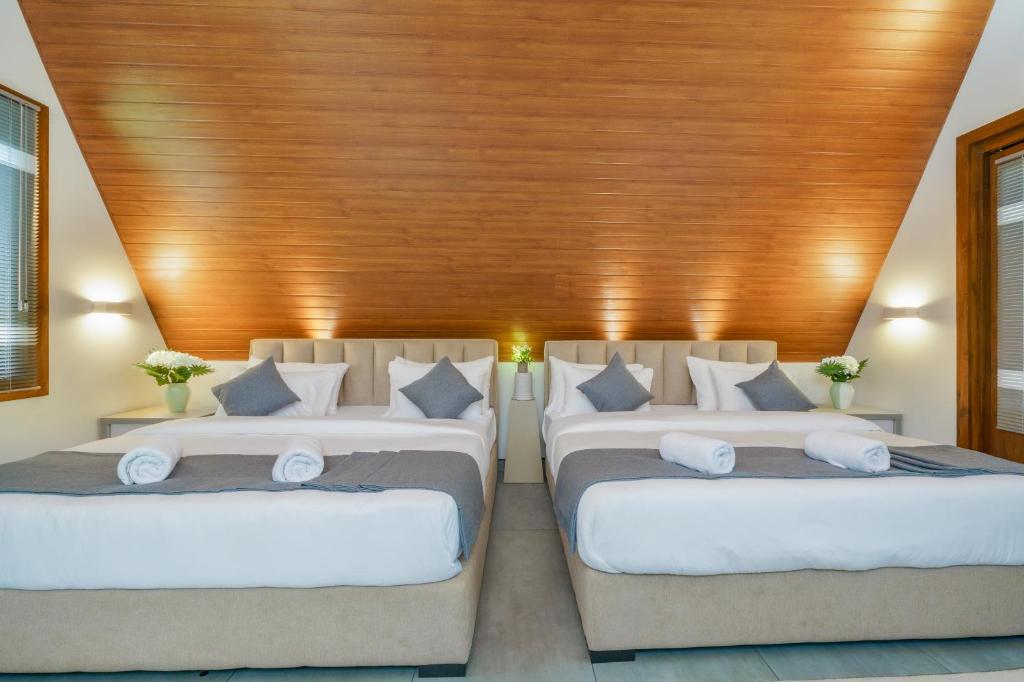Postel nebo postele na pokoji v ubytování Siyambala Resort - Udawalawa