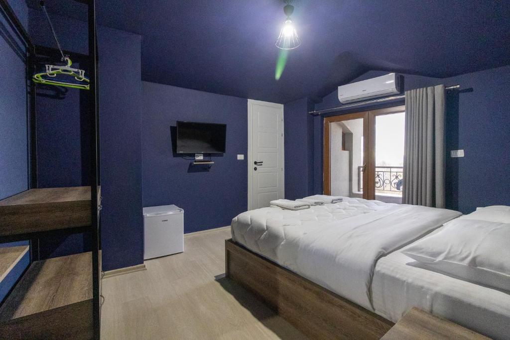 Postel nebo postele na pokoji v ubytování Artist House