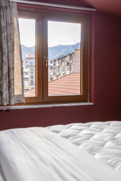 Postel nebo postele na pokoji v ubytování Artist House