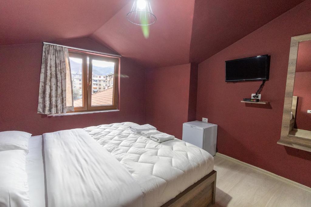Postel nebo postele na pokoji v ubytování Artist House