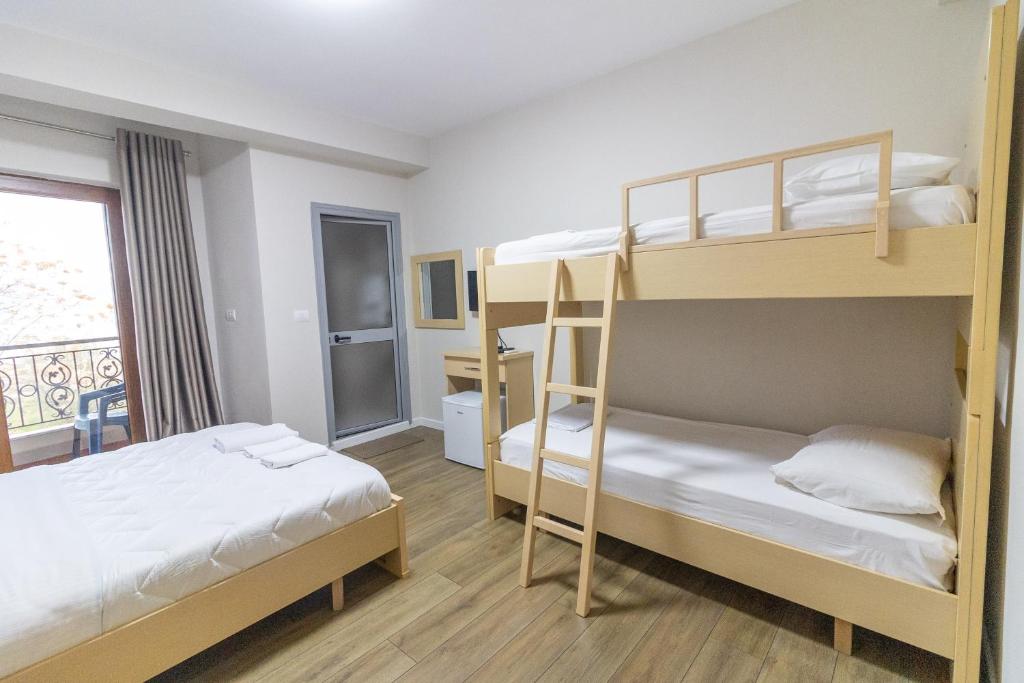 Postel nebo postele na pokoji v ubytování Artist House