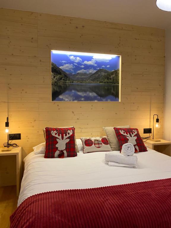Posteľ alebo postele v izbe v ubytovaní Apartaments Alta Muntanya