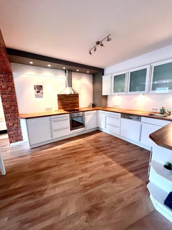 Kuchyň nebo kuchyňský kout v ubytování Sehr schönes und möbliertes Apartment