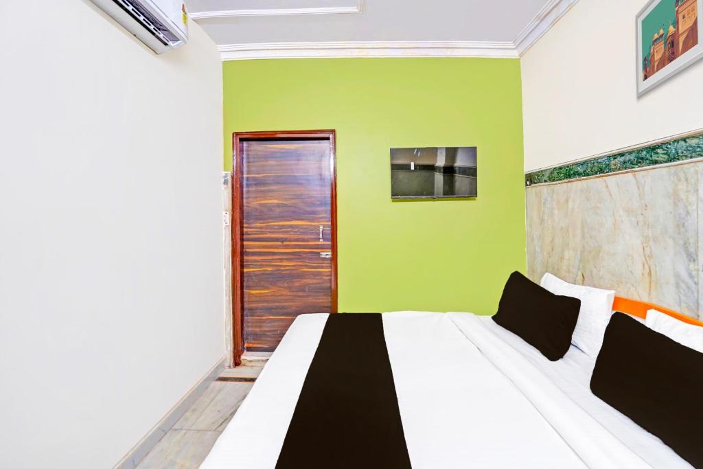 Postel nebo postele na pokoji v ubytování Super Hotel O JPS Lux