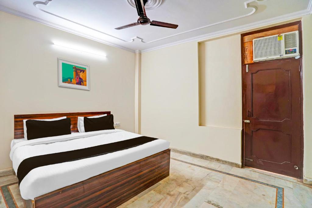 Postel nebo postele na pokoji v ubytování Super Hotel O JPS Lux