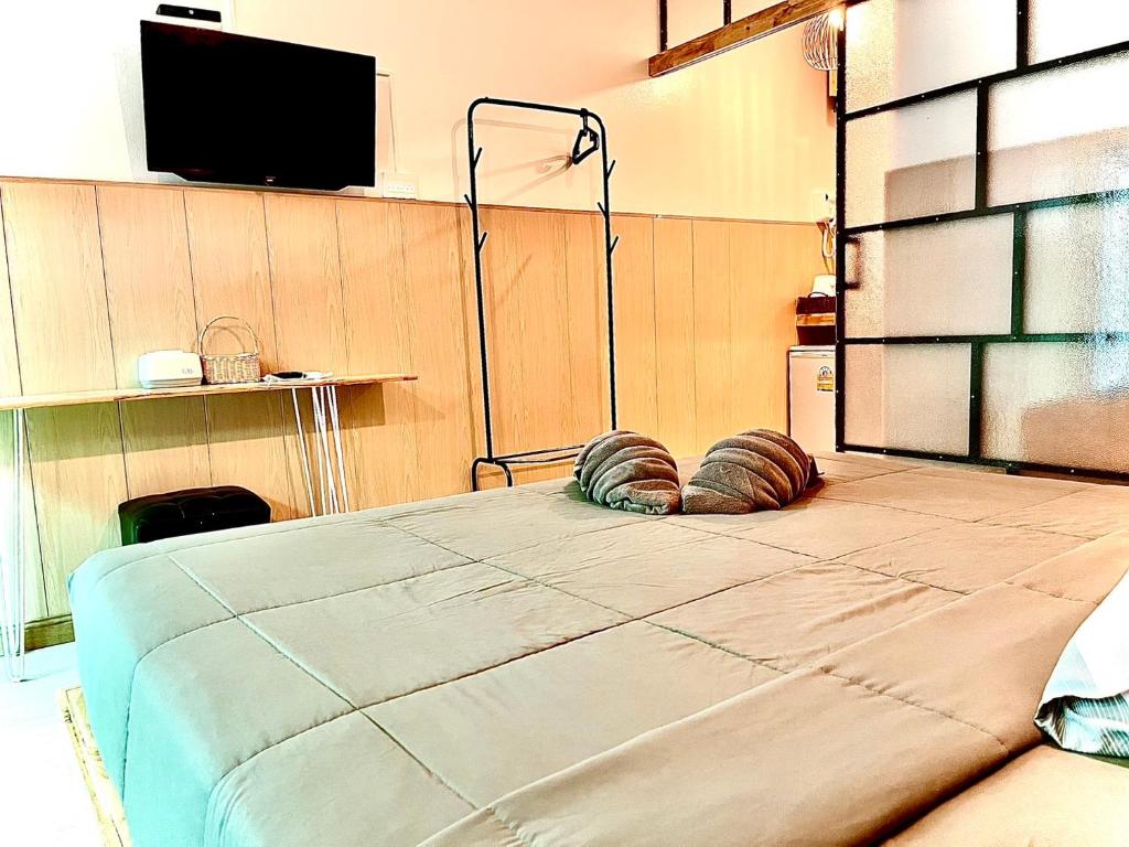Postel nebo postele na pokoji v ubytování Seasmile kohlarn