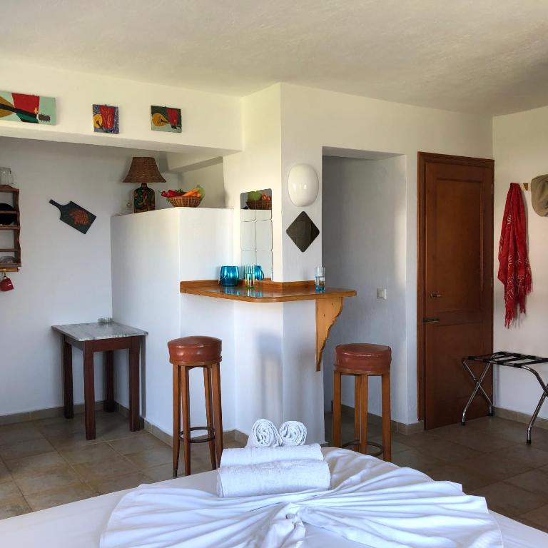 Postel nebo postele na pokoji v ubytování Del Sol Skopelos