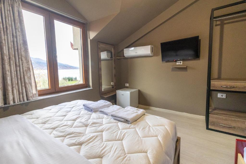 Postel nebo postele na pokoji v ubytování Artist House
