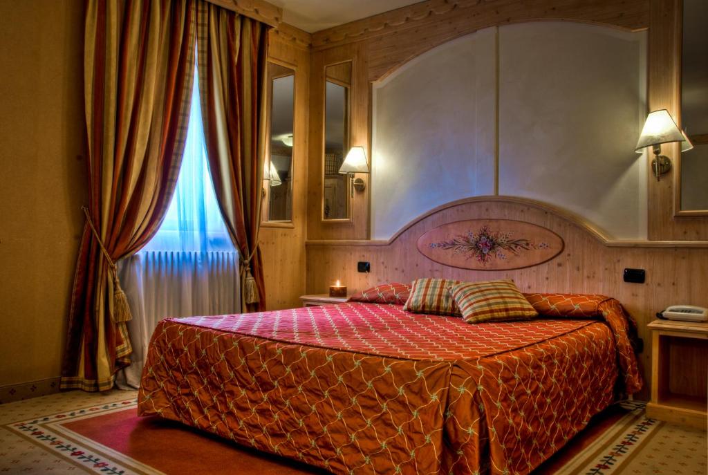 Postel nebo postele na pokoji v ubytování Hotel Rendez Vous