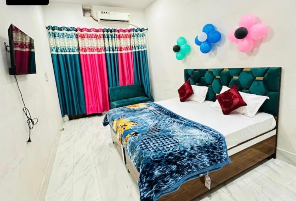 Postel nebo postele na pokoji v ubytování Hotel Sukoon