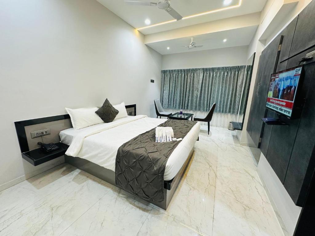 TV a/nebo společenská místnost v ubytování Hotel Diamond Executive